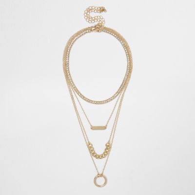 Gold tone layered chain choker necklace